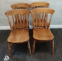 set of four spindle back dining chairs