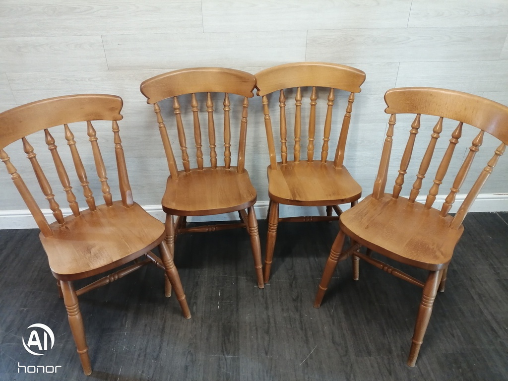 set of four spindle back dining chairs