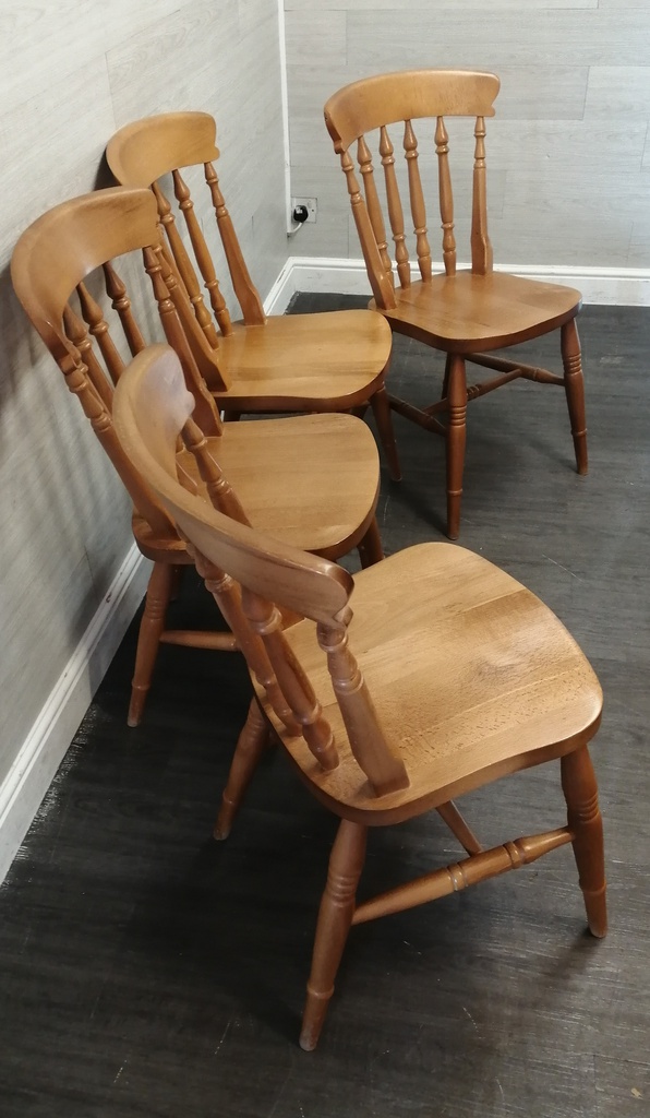 set of four spindle back dining chairs