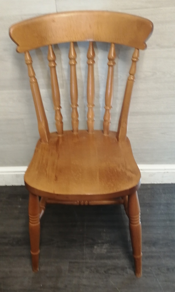 set of four spindle back dining chairs