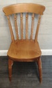 set of four spindle back dining chairs