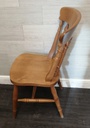 set of four spindle back dining chairs