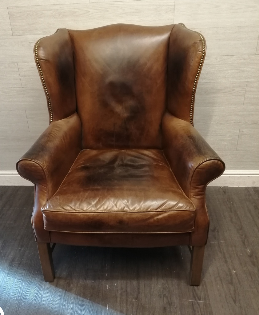 DISTRESSED TAN  LEATHER CHESTERFIELD STYLE ARMCHAIR