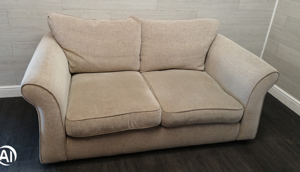 beige toned good size two seater sofa