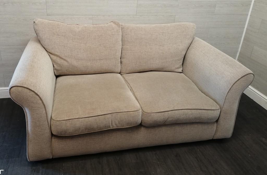 beige toned good size two seater sofa