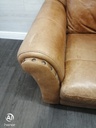 distressed tan leather three seater sofa