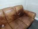 distressed tan leather three seater sofa