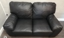 black faux leather two seater sofa