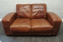 distressed tan leather two seater sofa