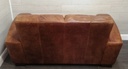 distressed tan leather two seater sofa