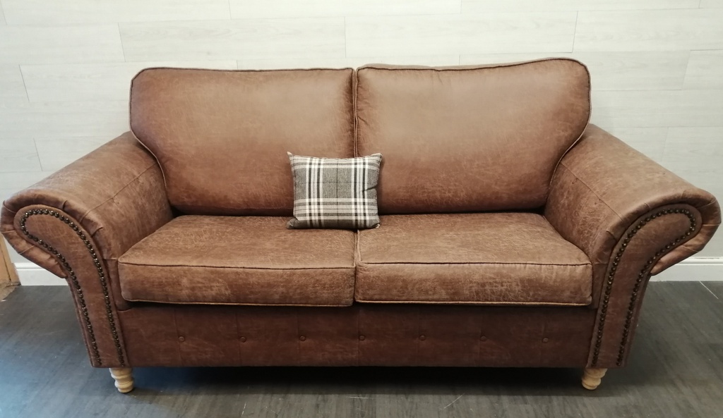 lovely brown toned three seater sofa