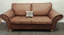 lovely brown toned three seater sofa