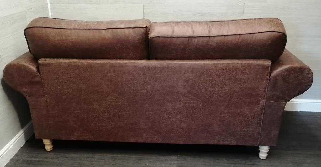 lovely brown toned three seater sofa