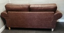 lovely brown toned three seater sofa