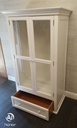 Neat glazed fronted white wardrobe