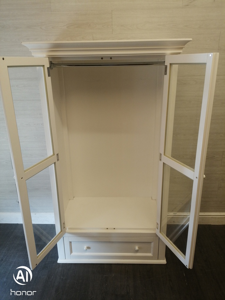 Neat glazed fronted white wardrobe