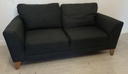 neat grey two seater sofa