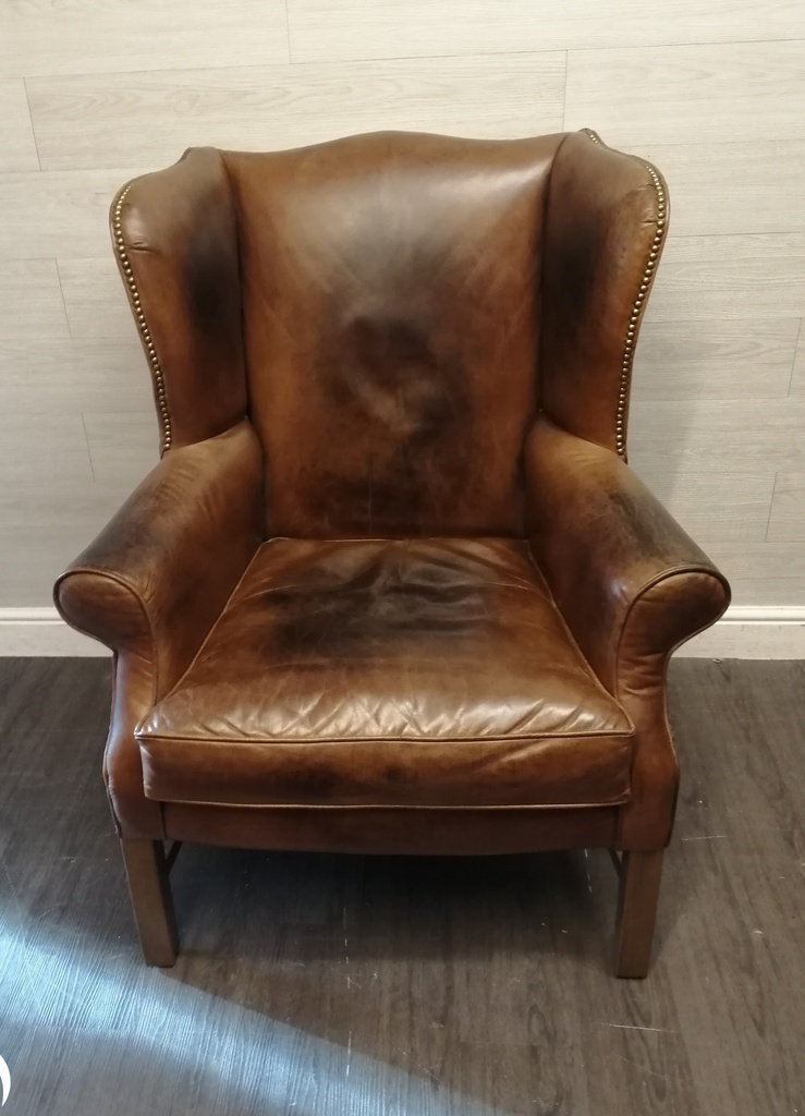 DISTRESSED TAN  LEATHER CHESTERFIELD STYLE ARMCHAIR